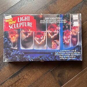 Vintage 1990s Mr Christmas mini mini light up sculpture string lights Santa face